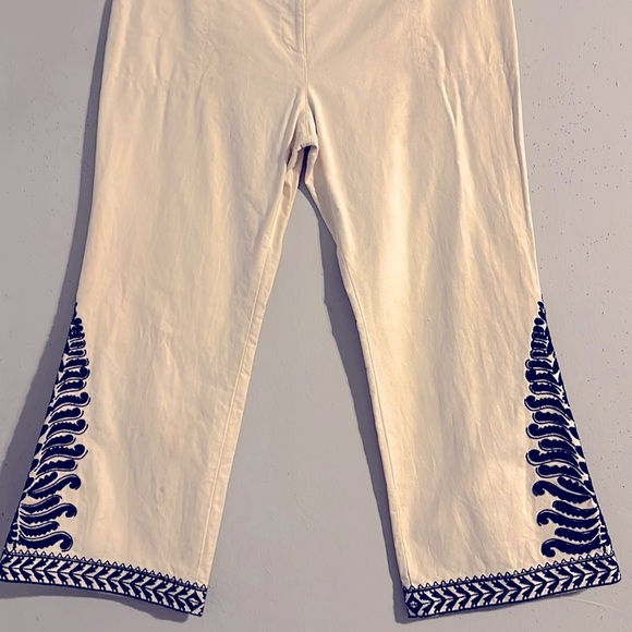 Tory Burch cream bell bottoms embellished with BLACK beads & BLACK embroidery